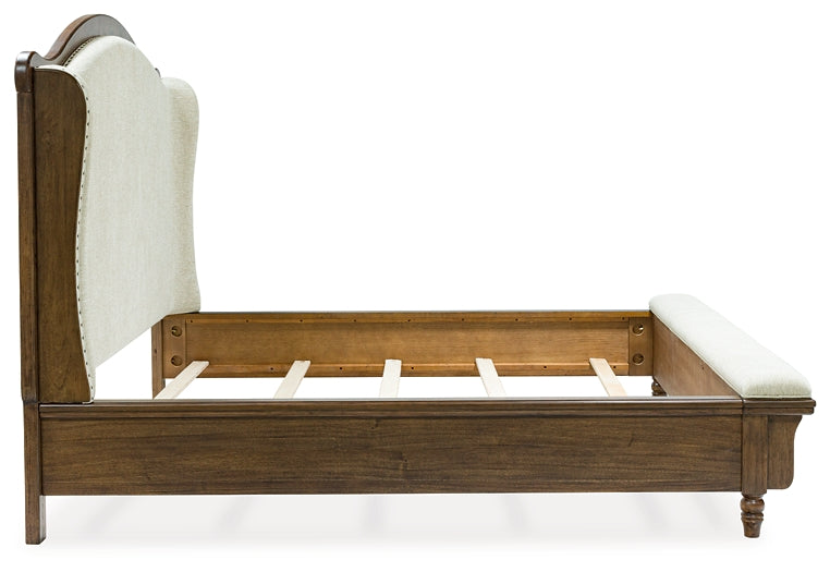 Sturlayne California King Upholstered Panel Bed with Mirrored Dresser and Chest