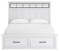 Ashbryn California King Panel Storage Bed with Mirrored Dresser and Chest