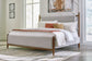 Lyncott California King Upholstered Bed with Mirrored Dresser, Chest and Nightstand