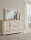 Shaybrock King Panel Bed with Mirrored Dresser and Chest