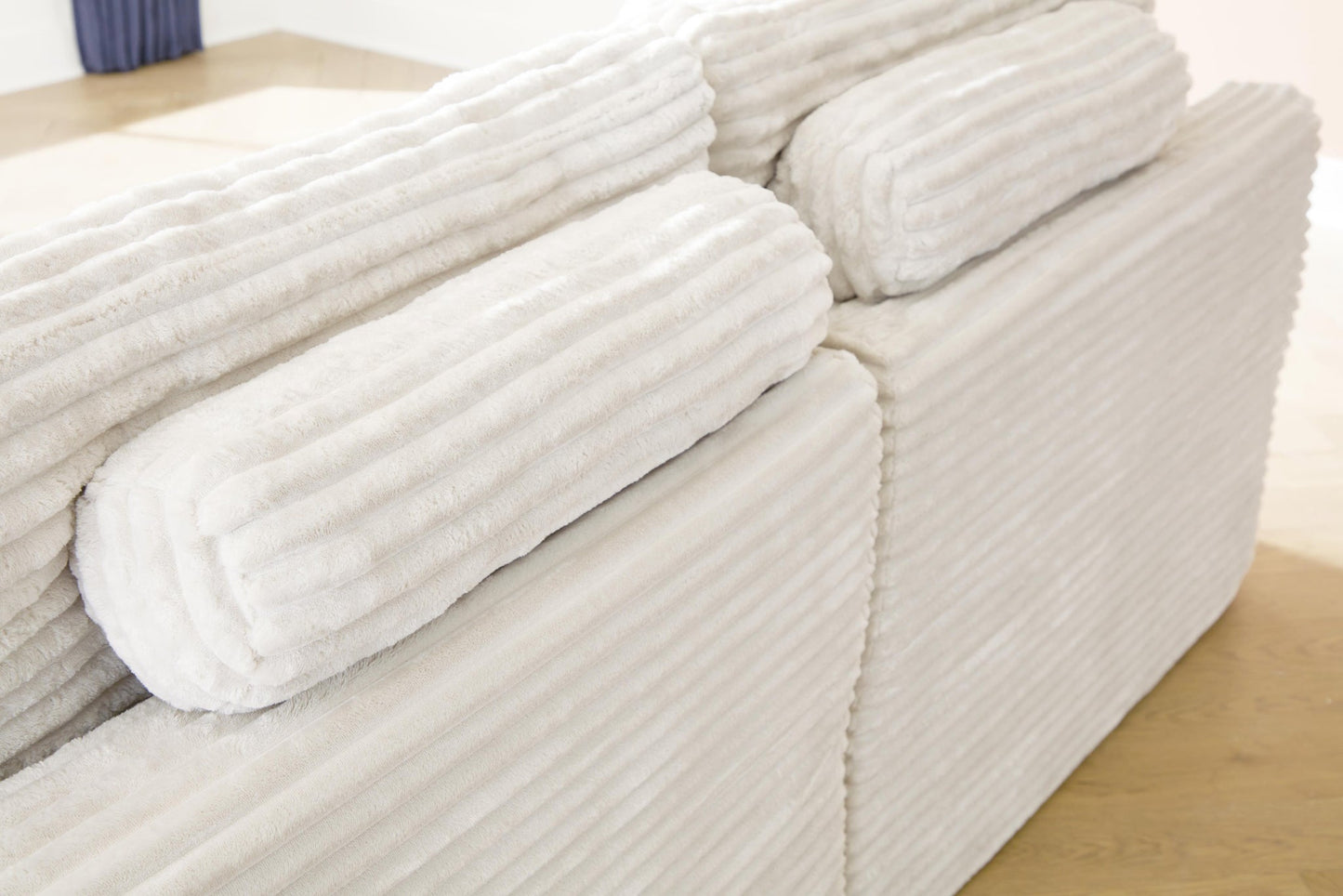 Ashley Express - Canefield 4-Piece Sectional with Ottoman