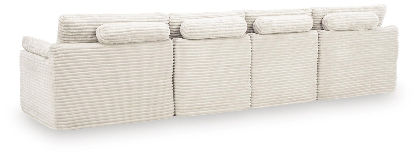 Ashley Express - Canefield 4-Piece Sectional with Ottoman