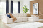 Ashley Express - Canefield 4-Piece Sectional with Ottoman