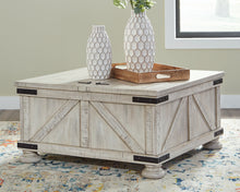 Load image into Gallery viewer, Ashley Express - Carynhurst Cocktail Table with Storage
