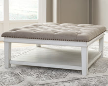 Load image into Gallery viewer, Ashley Express - Kanwyn UPH Ottoman Cocktail Table
