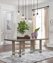Load image into Gallery viewer, Chrestner Dining Table and 8 Chairs with Storage
